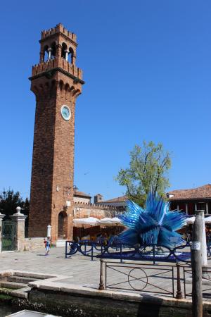 Murano Island, famous for its world-renowned glassmaking Clock Tower in Murano with a modern glass sculpture
