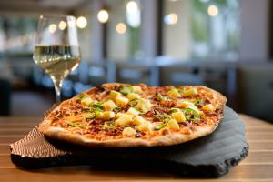Wood-fired pizzas at SAVOR Stone Hearth Pizza & Wine
