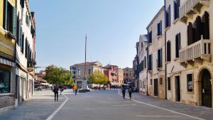 Crowded Campo Santa Margherita square in the evening