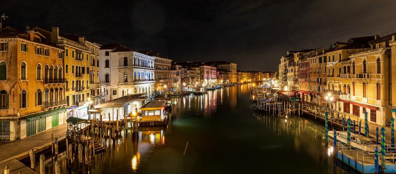 Grand Canal in Venice illuminated at night The Grand Canal of Venice at night with lights reflecting