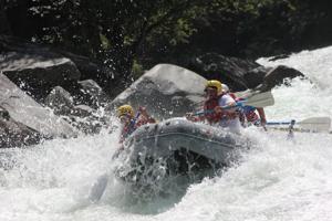 Rafting a rapid on the Tuolumne River