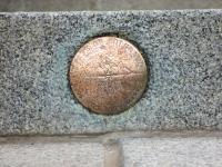Plaque embedded in one of the steps of the Colorado State Capitol