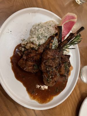 Cozy outdoor seating at Prego restaurant within The District